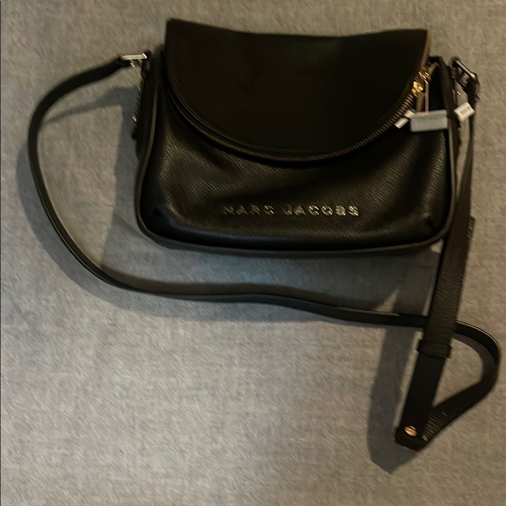 Marc Jacobs Black Leather Crossbody Bag with Flap Closure and Adjustable Strap